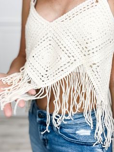 Be a boho babe with our Crochet Cropped Bustier Tank Top! This playful piece features delicate crochet and sassy fringe, perfect for any festival or beach day. Keep it cool and carefree with this quirky and stylish top. Fabric content: 100% Acrylic Summer Bohemian Crochet Top With Fringe, Sleeveless Fringe Crochet Top For Beach, Summer Beach Crop Top With Fringe, Beach Season Crochet Top With Fringe, Bohemian Mini-length Crochet Beach Top, Keep Cool, Beach Day, Beach Outfit, Tank Tops