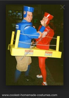 two people in costumes standing next to each other