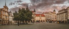 an empty square in the middle of some buildings