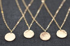 Delicate gold hammered disc necklace.  Shiny, delicate, and perfect for your bridesmaids. Disc measures 1/2 inch.  Sterling silver, 14k gold fill or rose gold filled disc on sterling silver chain is available. Make your selection at checkout.   All gold components are 14k GOLD FILL which is very durable and much heavier than gold plated, which it should not be confused with.  Gold fill will not lose its surface color as fast as plated metal.  It will remain rich in color and keep its luster.  It will act and wear as solid 14k gold at a fraction of the price.  Model is petite/small framed and is wearing 16 inches. Not sure what length to order?  Copy and paste this address in a new browser window: www.pinterest.com/pin/214695107208308498/ All bridesmaids gifts are package beautifully and re Jewelry Making Pearls, Hammered Silver Jewelry, Gold Disc Necklace, Silver Jewelry Diy, Circle Jewelry, German Silver Jewelry, Jewelry Words, Gold Medallion, Fine Silver Jewelry