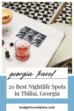 a table with two glasses and some food on it, the text reads georgia travel 20 best