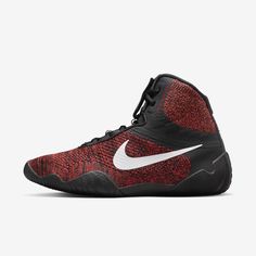 the nike hyper flyknit basketball shoe is shown in black, red and white