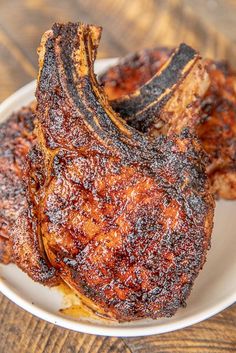 the ultimate pork chops recipe on a white plate