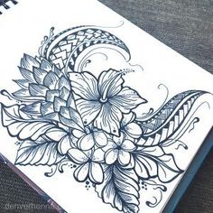 a notebook with some flowers on it