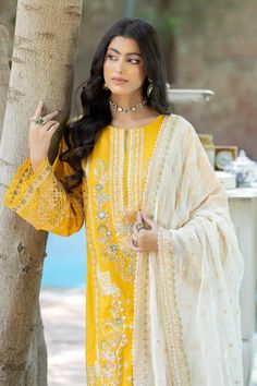 Yellow Embroidered Pakistani Salwar Kameez Dupatta Salwar Suit is an elegant masterpiece adorned with lavish designs, floral motifs, tilla, and Resham work. Embroidery and silver details give a traditional touch to this perfectly stitched Pakistani party Dress. Yellow Salwar Suit, Walima Dresses Pakistani, Yellow Salwar, Bridal Lehenga Indian, Pakistani Mehndi Dress, Suit Dupatta, Wedding Dresses Pakistani, Pakistani Women Dresses, Walima Dress