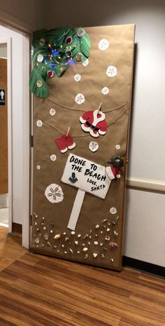 a door decorated to look like santa clause