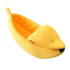 a banana shaped bed is shown on a white background