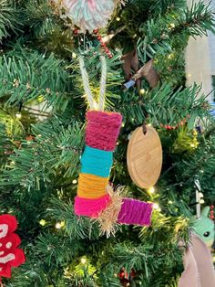 a christmas tree with ornaments hanging from it