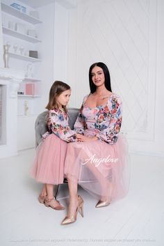 "A set of dresses for mom and daughter. Luxurious silk dresses with floral print.  Puffy skirt dresses for mom and daughter They are incredibly cool. Delicate dresses, at the same time very elegant. The classic style of dresses will always be relevant. Agree, it looks amazing.  Indulge yourself with luxurious looks with Family look from Angelove! The dress comes with a removable belt. A fluffy dress for a girl with a pale pink skirt. The top is made of matte silk with floral print. 100% cotton lining, deep-opening zipper for the comfort of even the smallest. Shine with Family Look by Angelove! Shine with Family Look by Angelove! I can sew any size for you.   Dear friend!  We appreciate that you entrusted Angelove to become part of your important event in life. Thank you for choosing our pr Elegant Spring Matching Set Dresses, Pink Matching Dresses For Spring, Dresses For Mom And Daughter, Tulle Photoshoot, Pale Pink Skirt, Tutu Shirt, Fluffy Dress, Mommy Daughter Outfits, Puffy Skirt