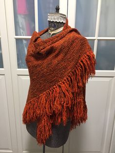 This is a beautiful and rare Hand loomed 70% wool shawl wrap. Lovely generous size. Measures 76 inches along the interior edge and 38 inches long at its longest point. Made by the much sought after Au Terroir out  of Ste. Madeleine Quebec Canada. Really timeless fashion piece to add to any style or wardrobe. I have also the matching wrap skirt and poncho both sold separately in the shoppe. Nice autumn / fall colours. Wool Shawl Wrap, Timeless Fashion Pieces, Vintage Shawl, Orange Autumn, Fall Colours, Vintage Shawls, 1930s Dress, Vintage Tapestry, Peasant Style