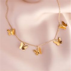 DescriptionButterfly Choker NecklaceProduct details: Size: 15.70" + 2.70" extWeight: 0.29 ozMaterial: 18k Alloy MetalColor: Gold/SilverHypoallergenic: Yes "Flutter into style with our Butterfly Choker Necklace! This unique piece features delicate butterflies for a fun and playful look. Perfect for adding a touch of whimsy to any outfit. 🦋" Party Butterfly Necklace With Adjustable Chain, Butterfly Charm Necklace For Party, Metal Butterfly Necklace With Adjustable Chain, Gold Metal Butterfly Necklace, Hypoallergenic Butterfly Jewelry For Parties, Gold Butterfly Necklace With Delicate Chain For Party, Gold Butterfly Necklace For Party, Dainty Butterfly Charm Necklace For Party, Metal Butterfly Necklace For Parties