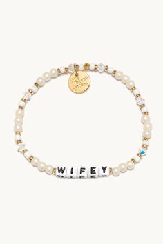 Let’s celebrate all the wifeys in our lives! Gift this handcrafted faux pearl bracelet to the girlie who’s about to wed her prince charming or the woman who’s been happily married for two decades. Part of a Bigger Story: Little Words Project is all about spreading kindness and empowerment through words. By wearing this bracelet, you become part of a larger community that shares the power of words. Bead Pattern: Bling Bling Hand-crafted, faux pearl and crystal beaded bracelet Plated Brass Hardwar Elegant Mother's Day Party Charm Bracelet, Personalized White Bracelets For Party, Elegant Adjustable Charm Bracelet With Letter Beads, Elegant Charm Bracelet With Letter Beads, Elegant Letter Beads Charm Bracelet As Gift, Elegant White Charm Bracelet For Mother's Day, Elegant Pearl Beaded Bracelets With Letter Beads, White Jewelry For Mother's Day Party, Party Bracelet With Letter Beads