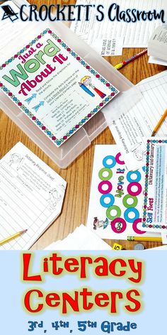 a pile of books and papers sitting on top of a wooden table next to pencils