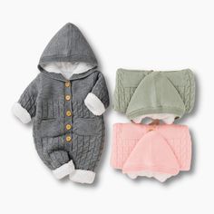 Keep your sweet babe warm all winter long with this adorable knitted baby romper with a hood, front pocket, and fastening front buttons for easy change. It has a thick double layer inside that gives security and warmth on colder days. It is made from soft, comfy knitted. Perfect for your little one's winter adventure. Material: Cotton Winter Knitted Long Sleeve Onesie, Winter Cotton Onesie, Gray Cotton Onesie For Winter, Knitted Baby Romper, Knit Baby Romper, Winter Adventure, Knitted Baby, Girls Rompers, Baby Romper