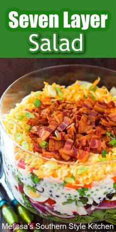 this layered salad is loaded with bacon, cheese and green onions for an easy side dish