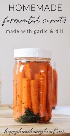 homemade fermented carrots made with garlic and dill in a jar