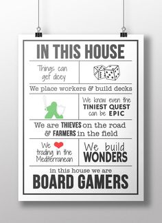 a poster that says in this house we play games