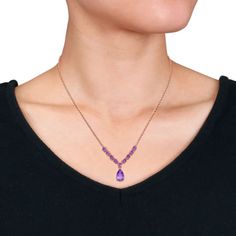 Enhance your neckline with the enchanting beauty of this 2 1/3CT TGW Pear and Oval-Cut Amethyst Lariat Necklace, elegantly crafted in rose plated sterling silver, with a length of 18 inches and an additional 2-inch extension. The lariat style features pear and oval-cut amethyst stones, adding a touch of regal allure to your ensemble. Whether worn as a statement piece or layered with other necklaces for a personalized look, this accessory exudes sophistication and charm. Embrace the timeless eleg Elegant Purple Lariat Necklaces, Elegant Purple Lariat Necklace As Gift, Amethyst Stones, Lariat Necklace, Amethyst Stone, To Shine, Amethyst Gemstone, Purple Amethyst, Gemstone Colors