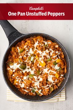 a skillet filled with one pan unstufffed peppers and topped with cheese