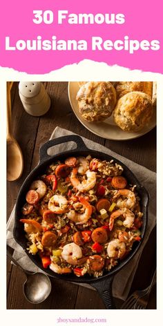 a pan filled with shrimp and rice next to muffins on top of a wooden table