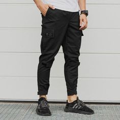 Cargo pants are a trend in recent years. They became so popular that they began to be used everywhere in the most different combinations of clothes. If you want to follow the trend, cargo pants will help you!GENERAL INFORMATION- Sizes: S, M, L, XL, XXL- Colors: black- Fabric: 100% cotton- Slim fit, velcro cuffs at the bottom- Velcro below the knee- Elastic band and cord for adjustment at the waist.Pockets:- main oblique in front- patch pockets in the knee area- overhead at the backSIZE:We use th Cyberpunk Pants, Steampunk Pants, Mens Hairstyles Curly, Multi Pocket Vest, Combat Pants, Cargo Vest, Hunting Pants, Tactical Pants, Hiking Pants