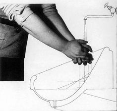 two hands holding each other over a drawing