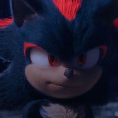 sonic the hedgehog from sonic the hedgehog is looking at something in front of him