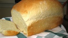 a loaf of bread sitting on top of a towel