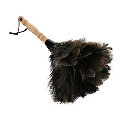 a black and brown feather duster with a wooden handle on it's end