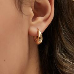 Description - Minimal and unique, our new Gold Coast Hoops are the cutest addition to earring stack. Made of high-quality durable material, perfect for everyday wear! • Width : 13mm • Premium Quality Copper + 18k gold plating • Water-Resistant & Sweatproof - shower, swim, and exercise with it, the color remains perfect • Hypoallergenic Jewelry Care: - Wipe with a soft cloth + jewelry cleaner every 3-4 months for a clean polished look. Sunnie Jewelry 1 year warranty Trendy Gold Plated Cartilage Earrings For Everyday, Trendy Everyday Gold Plated Cartilage Earrings, Trendy 14k Gold Filled Earrings For Everyday Wear, Trendy 14k Gold Filled Huggie Earrings, Trendy Gold Cartilage Earrings For Everyday, Trendy Everyday Gold Cartilage Earrings, Trendy Rose Gold Tarnish-resistant Huggie Earrings, Earring Stack, Cloth Jewelry