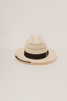 DESCRIPTION The Tremé features a mid size brim and cattleman crown. It's made of fine, handwoven paper straw. Delicate venting makes the hat a great summer option in the heat. The hat's distressed band is comprised of thick stacked, two-tone grosgrain ribbon and bow — topped off with a brass Two Roads crest pin. You'll also find a small piece of grosgrain edging on the front right corner. HAT SIZE CHART 55 57 59 61 63 Size S M L XL 2XL Inches 21 1/2" 22 1/4" 23 23 7/8" 24 5/8" Fitted Size 6 7/8 Handwoven Toquilla Straw Fedora Panama Hat, White Straw Fedora For Rodeo, Handwoven Toquilla Straw Hat With Curved Brim, Straw Panama Hat With Curved Brim, Woven Toquilla Straw Fedora With Short Brim, Handwoven Toquilla Straw Fedora, Handwoven Toquilla Straw Panama Hat, Kentucky Derby Woven Panama Hat In Toquilla Straw, Kentucky Derby Woven Panama Hat