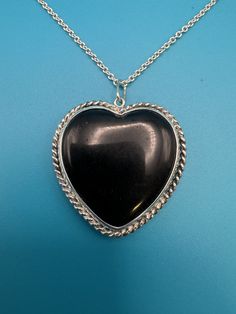 About 1.25"x1.25" silver heart necklace. Handmade in USA.  Chain 16"-18" adjustable. Since the pendant is handcrafted from sterling silver, it's resistant to all usual environmental factors and it doesn't cause any allergies or skin irritation. It may tarnish and darken with time, same as all silver jewelry but if you don't like this antique look of silver, you can easily polish it back into a mirror finish. Silver Gemstone Heart Pendant Necklace, Heart-shaped Sterling Silver Gemstone Necklace, Silver Open Heart Gemstone Necklace, Silver Double Heart Gemstone Necklace, Silver Gemstone Double Heart Necklace, Sterling Silver Heart-shaped Gemstone Necklace, Sterling Silver Heart-shaped Jewelry With Large Pendant, Silver Heart Jewelry With Large Pendant, Sterling Silver Heart Necklace With Gemstone