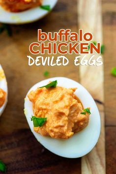 buffalo chicken deviled eggs on a wooden table