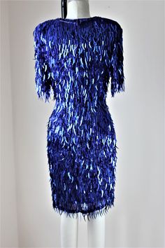 "Stunning Dress!! This is a figure flattering, Make the room stop and look, type of dress!! Absolutely beautiful and in excellent condition!! Measuring: 35\" length Bust: 36\" Waist: 28\" Hip: 36\" Pet Free/smoke free Enjoy!" Blue Shark, Shark Tooth, Shark Teeth, Sequin Beading, Types Of Dresses, Beaded Dress, Stunning Dresses, Sequin Dress, Etsy Vintage