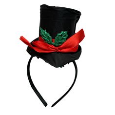 Step into the holiday spirit in style with our festive Top Hat Headband! This delightful accessory is perfect for adding a touch of elegance and fun to your seasonal celebrations. The headband features a mini black top hat adorned with a vibrant red ribbon and a festive green holly leaf embellishment. Whether you’re attending a Christmas party, holiday parades, or simply spreading cheer at home, this charming piece instantly elevates your festive attire. Crafted for comfort, the soft and sturdy Holiday Mini Hats With Headband, Holiday Mini Hat Headband, Holiday Headband Mini Hats, Holiday Adjustable Fascinator, Adjustable Headband For Holiday Festivities, Top Hat Headband, Holiday Parades, Holiday Headbands, Festive Attire