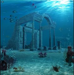 an underwater scene with columns and corals