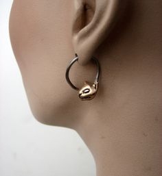 Cat hoop earings for stretched piercings. Cats sculptured in bronze with 14 gauge ear wire in surgical 316L steel submerged inside. Super durable and quite unique. MADE ON DEMAND, takes me up to 7 workdays to complete. If you prefer the other side of the food chain;) https://www.etsy.com/listing/122720201/14-gauged-earrings-bird-claws? My other cat items: https://www.etsy.com/shop/AnnaSiivonen/search?search_query=Cat&order=date_desc&view_type=gallery&ref=shop_search Unique Metal Hypoallergenic Hoop Earrings, Internally Threaded Hoop Plug Earrings As Gift, Unique Hypoallergenic Metal Hoop Earrings, Unique Hoop Wrap Earrings For Pierced Ears, Internally Threaded Metal Hoop Earrings For Gift, Earring Hole, Plug Earrings, Heavy Earrings, Cat Items