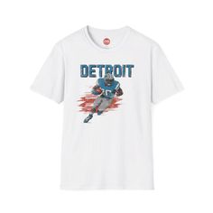 Show off your love for the Detroit Lions with this retro-inspired football t-shirt, perfect for any die-hard fan! Crafted on a Unisex Softstyle T-Shirt, this tee offers ultimate comfort and style for both men and women. The vintage design gives you that old-school look while cheering on your favorite team. Whether you're heading to the game, watching from home, or simply want to represent your team around town, this Detroit shirt is a must-have. The soft, lightweight fabric makes it perfect for Football Season Graphic Tee In Team Colors, Team-colored Graphic Tee For Football Season, Throwback Graphic Print Tops For Football Season, Football Season Team Spirit Graphic T-shirt, Team Spirit Football Season Graphic T-shirt, Football Season Graphic Tee With Team Logo, Football Season Fan Merchandise Graphic Tee, Football Season Fan Apparel T-shirt With Screen Print, Throwback T-shirt With Logo Print For Game Day