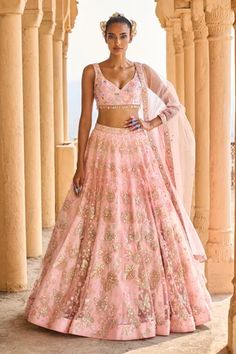 Peach lehenga with butterfly, floral print and sequin, zari, stone embellishment. Paired with sleeveless blouse and dupatta.
Component: 3
Pattern: Printed, Embellished
Type Of Work: Sequin, butterfly, floral, zari, stone
Neckline: Sweetheart
Sleeve Type: Sleeveless
Fabric: Velvet, Lining: Satin
Color: Peach
Other Details: 
Back tassel tie-up
Tassel bordered blouse
Sheer dupatta
Occasion: Bride - Aza Fashions Lehenga Choli Designer, Choli Design, Peach Lehenga, Net Lehenga, Choli Designs, Designer Blouse Patterns, Designer Blouse, Satin Color, Sweetheart Neck