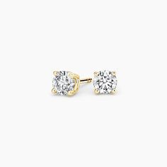 Perfect 4-Prong Diamond Stud Ears (3/4 ct. tw.) - 18K Yellow Gold. Our timeless basket setting maximizes light and sparkle while hugging the diamond on all sides for extra security. Carefully crafted by our experts, this design sits perfectly and never sags or tips.

With unmatched craftsmanship and attention to detail, every aspect of each piece in The Perfect Collection is expertly designed for a look that lasts a lifetime. Chalcedony Crystal, Diamond Earrings Studs Round, Yellow Gold Setting, Brilliant Earth, Diamond Stud Earrings, Emerald Earrings, Purple Crystals, Diamond Stud, Green Gemstones