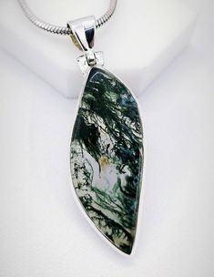 A beautiful handmade creation of Moss Agate Stone Pendant with Solid Sterling 925 Silver. We make our jewelry with fine quality of workmanship and high quality semi precious stones. This Beautiful Moss Agate Stone is from . This is a beautiful handmade creation.  Moss Agate speeds up recovery from illness. It is anti-inflammatory, cleanses the circulatory and elimination systems, and boosts the immune system. It assists midwives by lessening pain and ensuring a good delivery. Moss Agate prevents Ocean Jasper Gemstone Jewelry For Gifts, Moss Agate Cabochon Pendant Jewelry, Unique Silver Moss Agate Jewelry, Elegant Moss Agate Cabochon Jewelry, Unique Silver Ocean Jasper Jewelry, Silver Ocean Jasper Jewelry For Gift, Unique Cabochon Moss Agate Jewelry, Silver Moss Agate Cabochon Jewelry, Unique Moss Agate Cabochon Jewelry