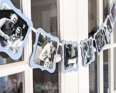 an old photo is hanging on a clothes line in front of a window with pictures