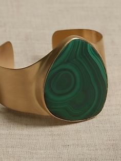 A daring statement for the curves of the wrist, this intensely beautiful malachite stone is gently angled and set in a satin-finished brass cuff.  VERDANT DREAMS COLLECTION: Considered one of the oldest and luckiest of gemstones, gorgeous green malac Leather Wrist Cuff, Statement Cuff Bracelet, Metalsmithing Jewelry, Brass Cuff, Green Malachite, Malachite Stone, Gold Statement Earrings, Hinged Bracelet, Brown Silver