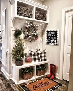 the entryway is decorated with christmas decorations and wreaths