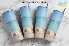 three personalized tumblers with beach scene and starfish in the sand on marble background