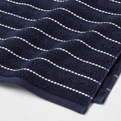 a blue towel with white lines on it