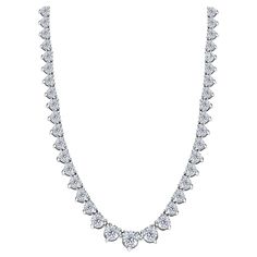 This stunning and impressive Riviera Necklace features a substantial Diamond weight of 30.00 Carats in beautifully graduated Round Brilliant Cut gems with a sparkly white color G/H clarity SI1. Each stone has a three-claw setting with an open gallery and is set in 18 Karat White Gold with a British Hallmark. Other Carat weights are available, also available in 18 Karat Rose or Yellow Gold on the request. Riviera Necklace, Diamond Carat Size, Chris Evert, Diamond Tennis Necklace, Heritage Jewellery, White Gold Necklaces, Tennis Necklace, Modern Necklaces, Link Necklace