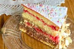 a piece of cake sitting on top of a glass plate