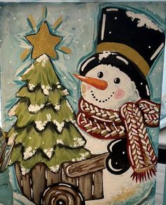 a painting of a snowman with a christmas tree