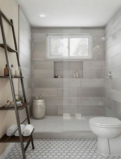 a white toilet sitting next to a window in a bathroom under a ladder with shelves on it